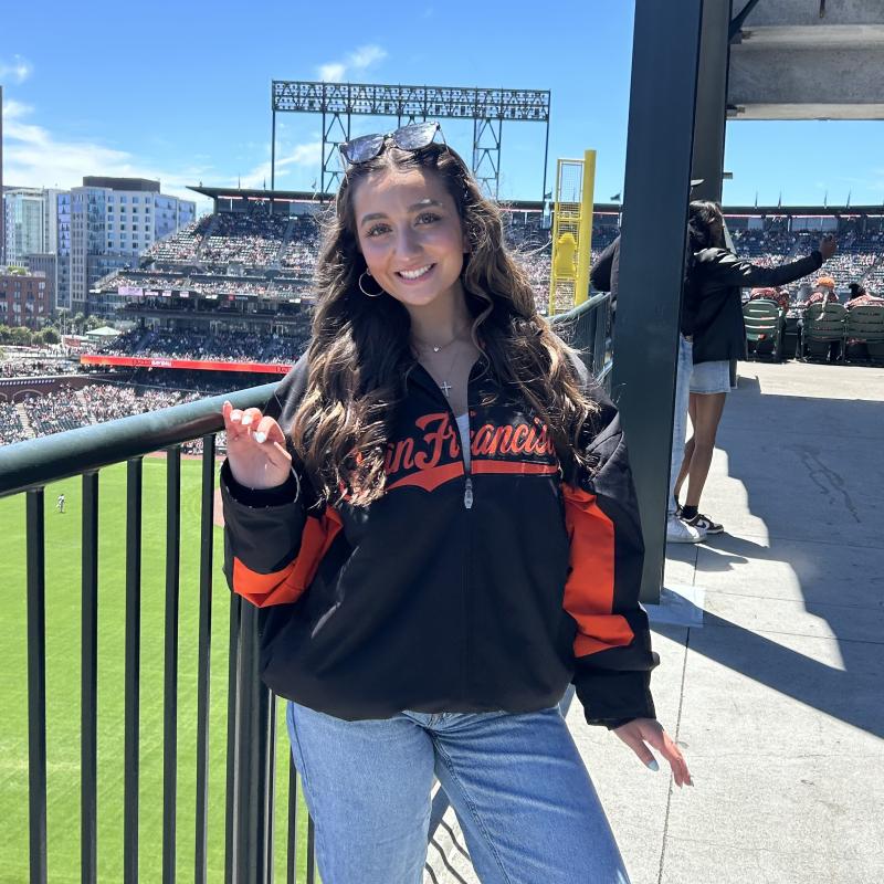 Alyssa wearing Giants Baseball Team Jacket