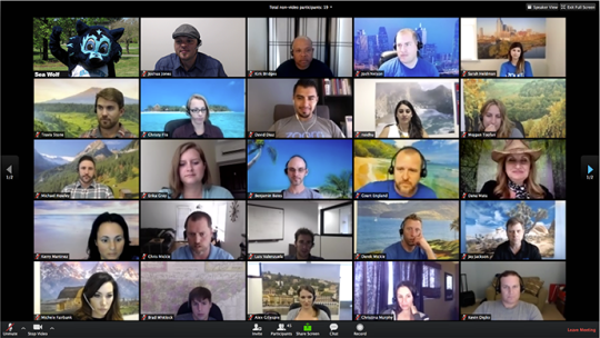 Zoom gallery view showing a grid of multiple participants with different virtual backgrounds.