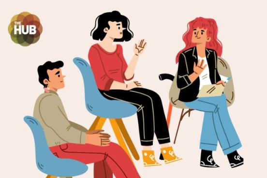 a group of people in dialogue